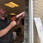 Turkington team member installing new windows